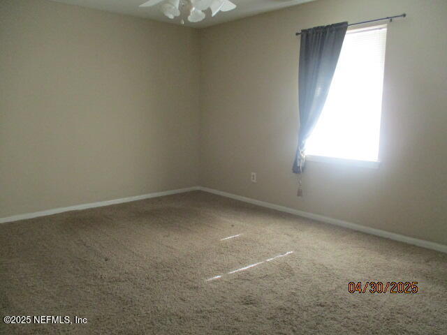 11375 Pine Loop Glen St. Mary, FL 32040 - Photo 11 of 33 an empty room with a window