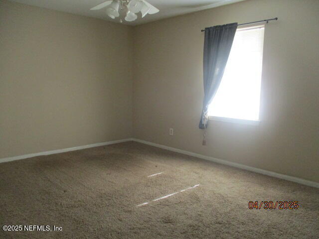 11375 Pine Loop Glen St. Mary, FL 32040 - Photo 12 of 33 an empty room with a window