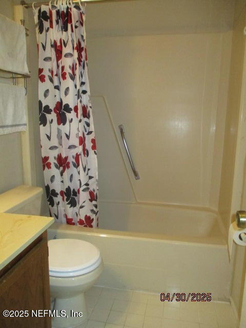 11375 Pine Loop Glen St. Mary, FL 32040 - Photo 13 of 33 a bathroom with a toilet and a shower curtain