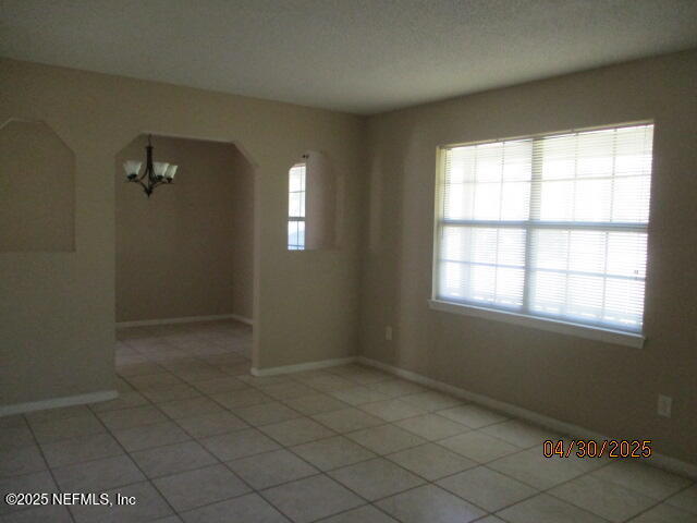 11375 Pine Loop Glen St. Mary, FL 32040 - Photo 17 of 33 an empty room with windows