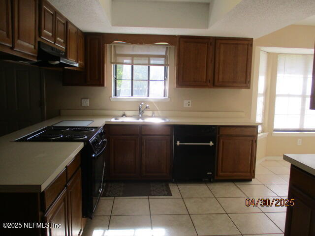 11375 Pine Loop Glen St. Mary, FL 32040 - Photo 9 of 33 a kitchen with a cabinets and window