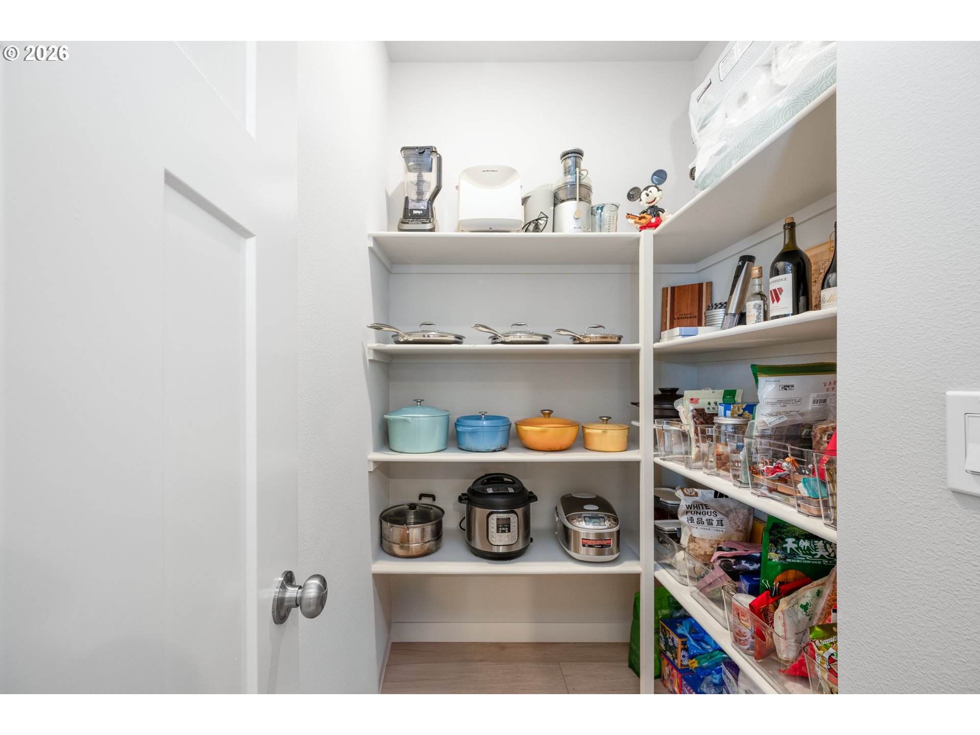 16800 Southwest Dowitcher Lane Beaverton, OR 97007 - Photo 12 of 48 a shelf with cup and plates
