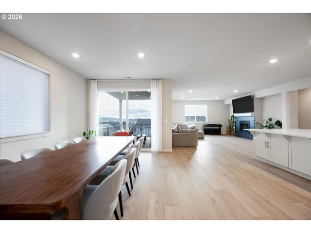 a kitchen with a table and chairs