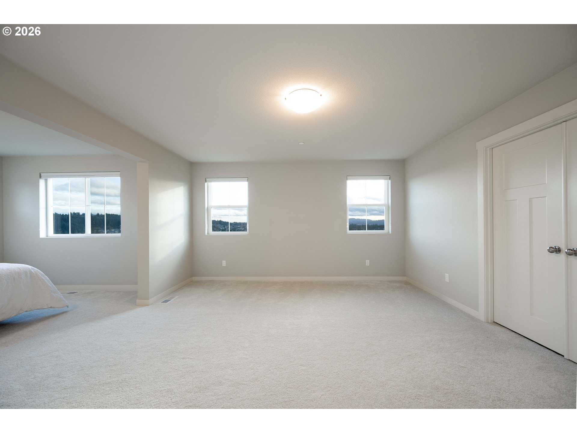 16800 Southwest Dowitcher Lane Beaverton, OR 97007 - Photo 21 of 48 a view of an empty room with a window