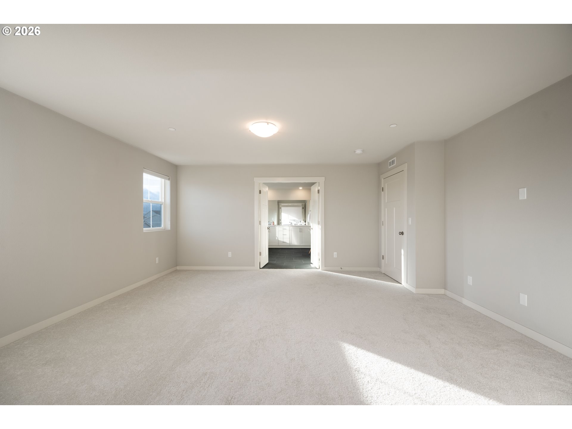 16800 Southwest Dowitcher Lane Beaverton, OR 97007 - Photo 23 of 48 a view of an empty room with window and closet area