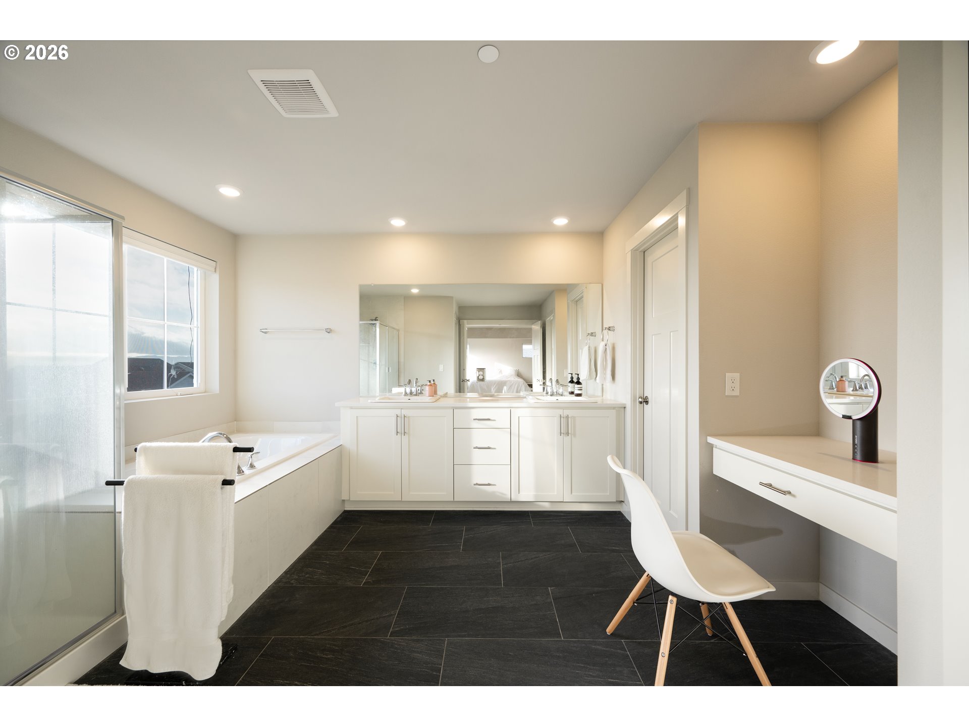 16800 Southwest Dowitcher Lane Beaverton, OR 97007 - Photo 24 of 48 a view of kitchen with a sink dishwasher a dining table chairs with wooden floor