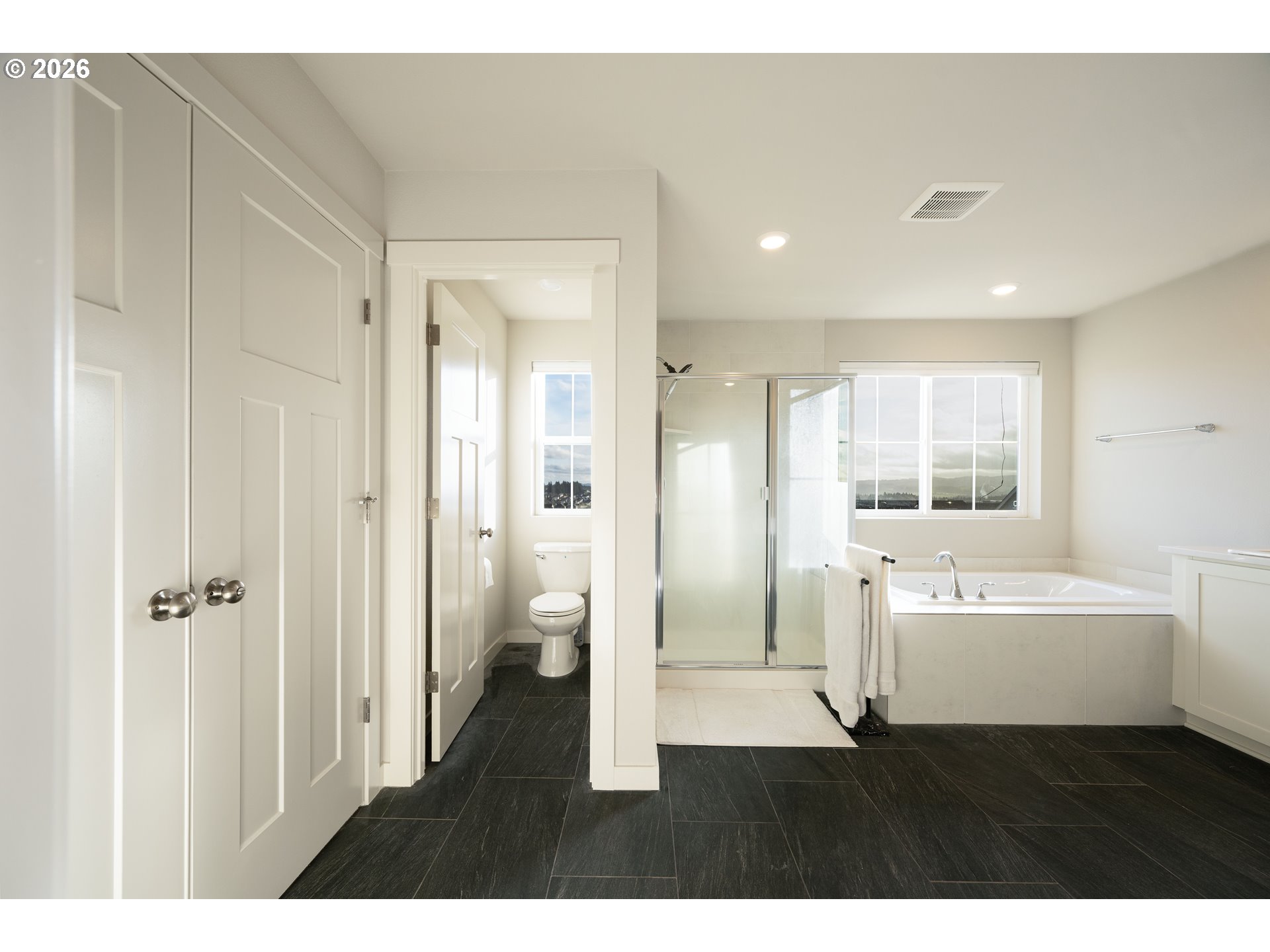 16800 Southwest Dowitcher Lane Beaverton, OR 97007 - Photo 25 of 48 a bathroom with a bathtub sink and a shower