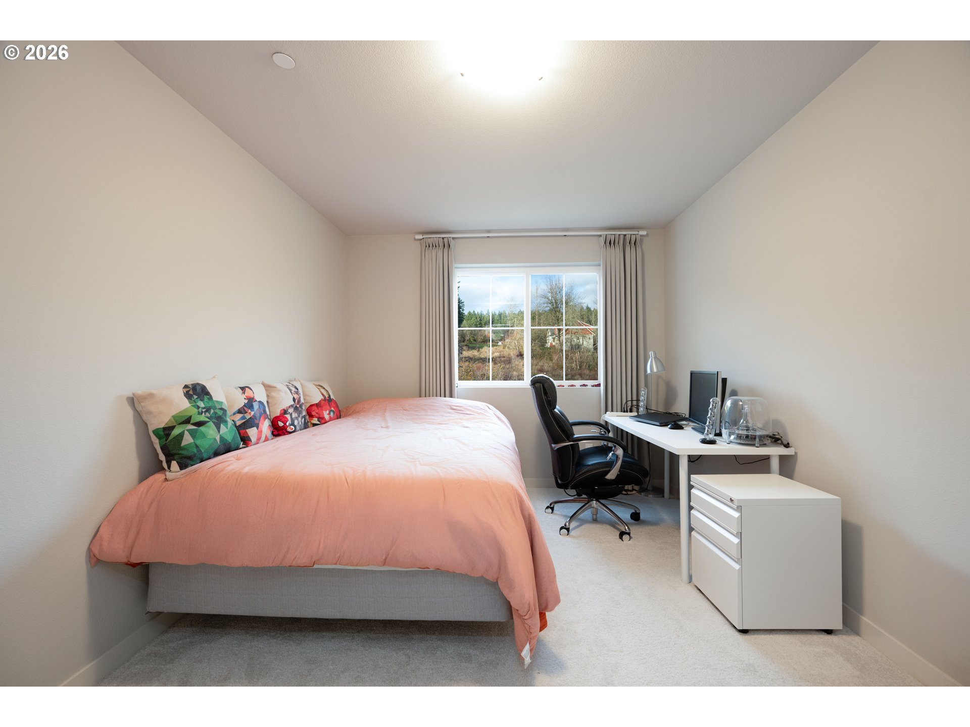 16800 Southwest Dowitcher Lane Beaverton, OR 97007 - Photo 29 of 48 a bedroom with a bed and window