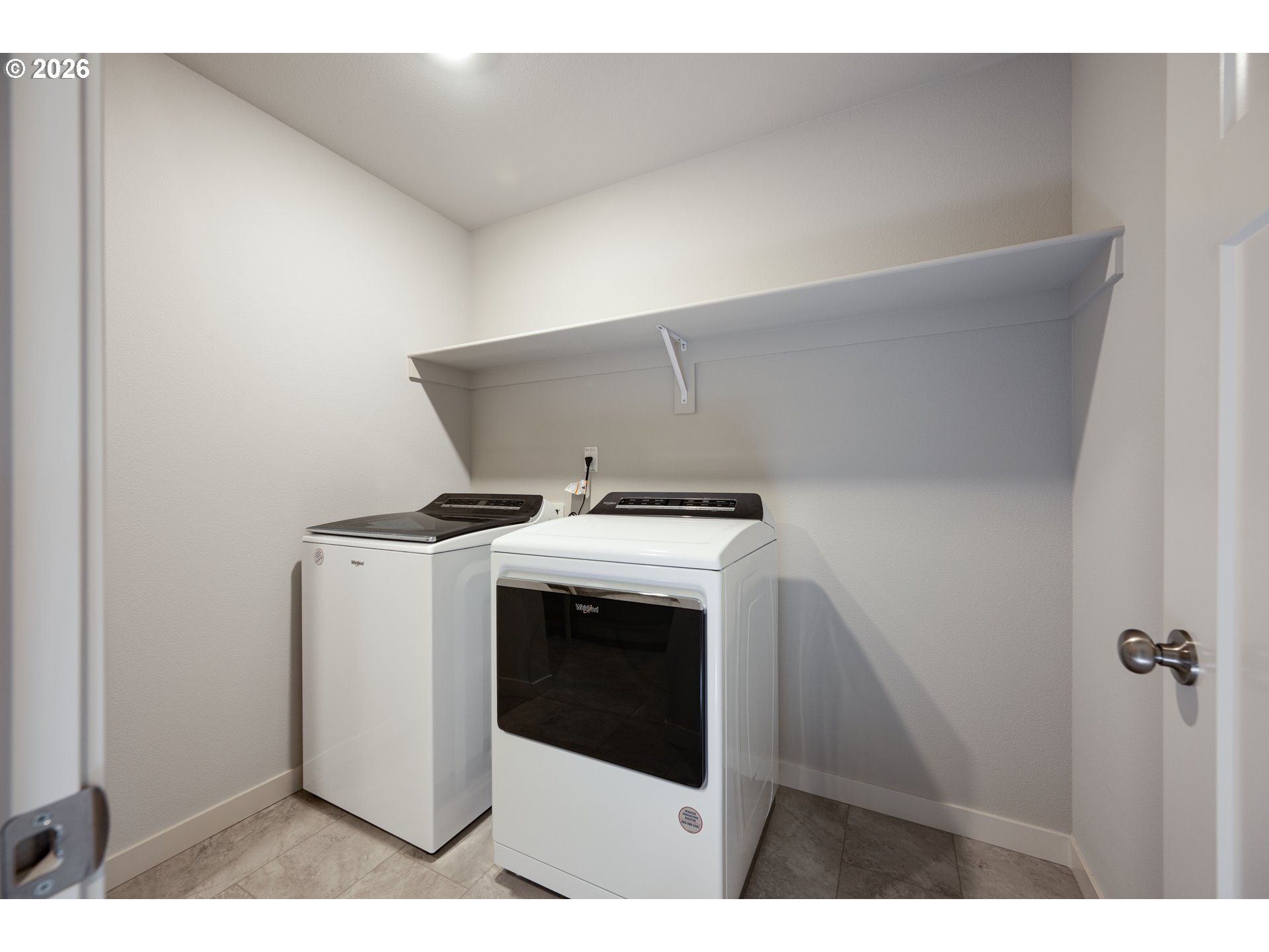 16800 Southwest Dowitcher Lane Beaverton, OR 97007 - Photo 37 of 48 a utility room with dryer and washer