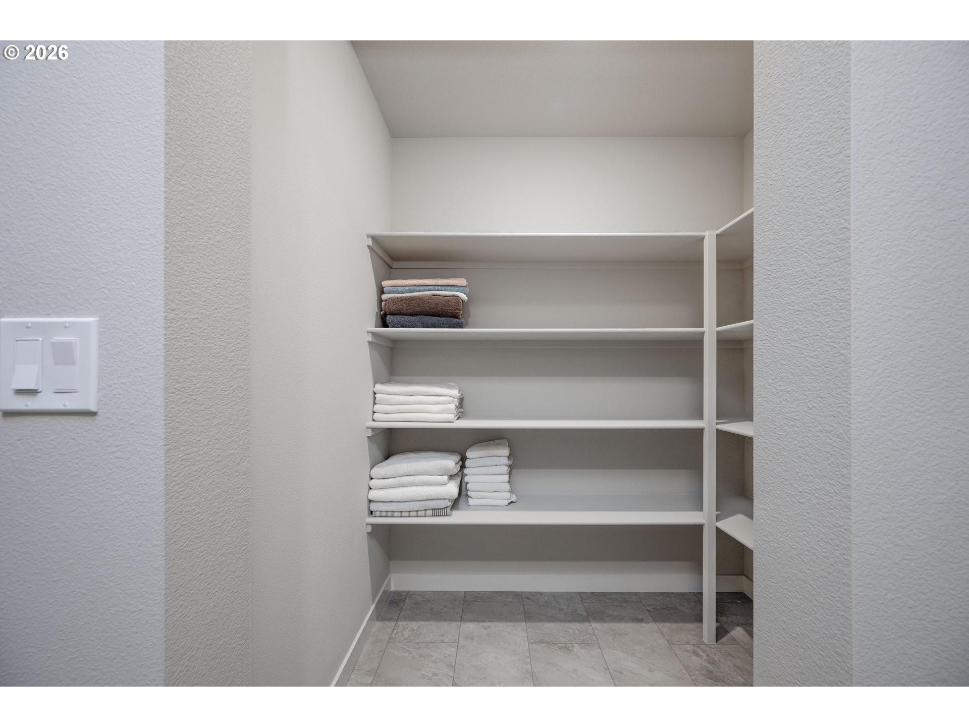 16800 Southwest Dowitcher Lane Beaverton, OR 97007 - Photo 39 of 48 a view of a room with shelves