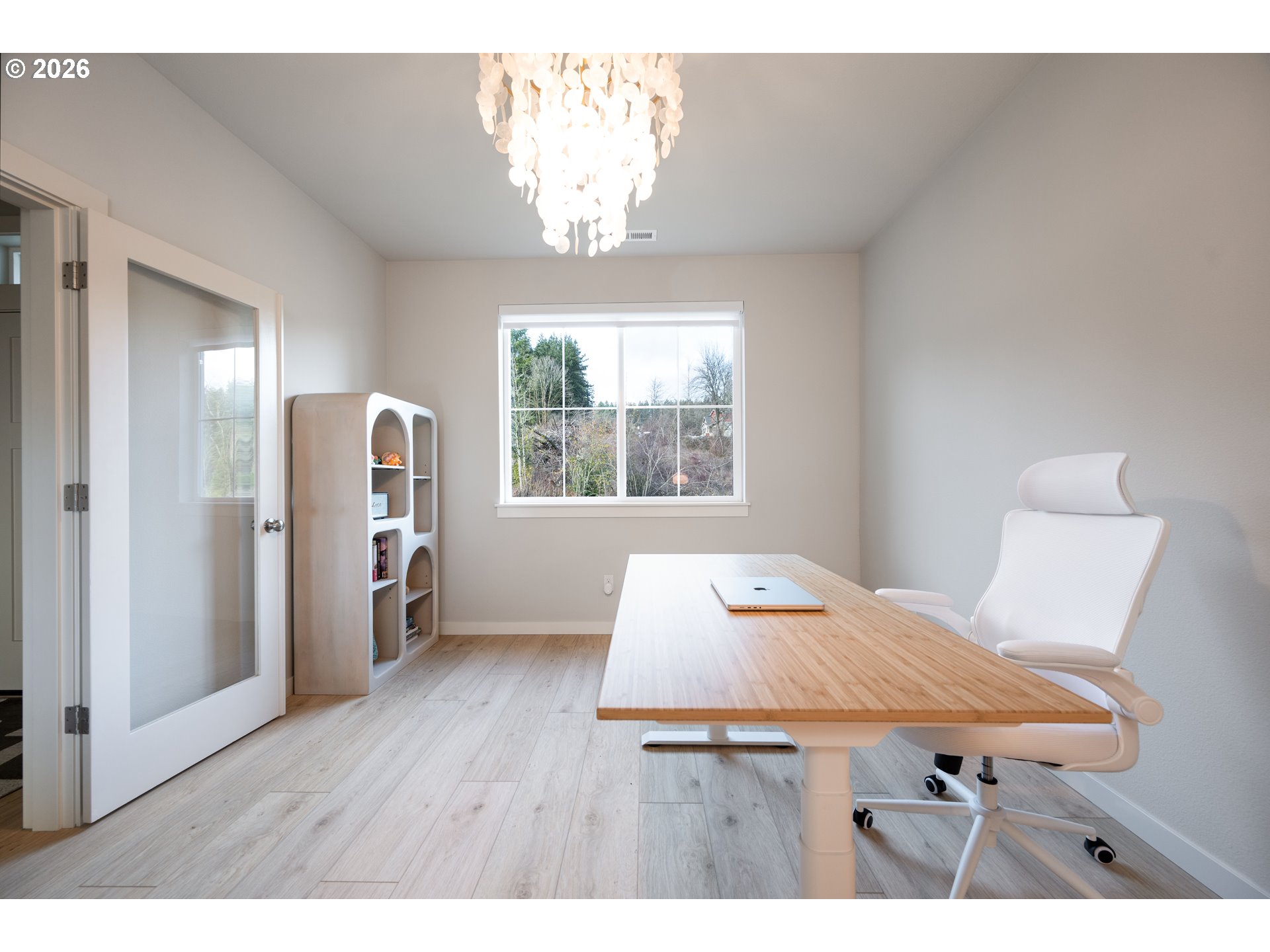 16800 Southwest Dowitcher Lane Beaverton, OR 97007 - Photo 4 of 48 a view of a dining room with furniture and window