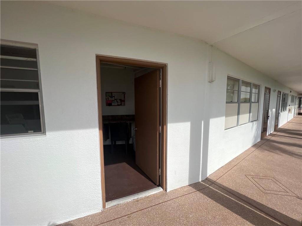 1054 Cornwall C, Unit 1054 Boca Raton, FL 33434 - Photo 21 of 22 Laundry is one door over!
