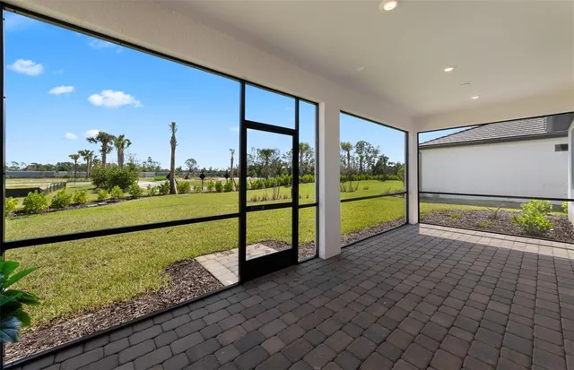 a view of a garden with an outdoor seating