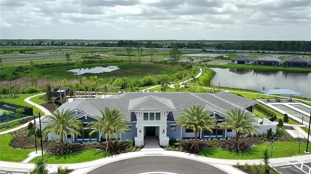 a view of a lake with a building in front of it