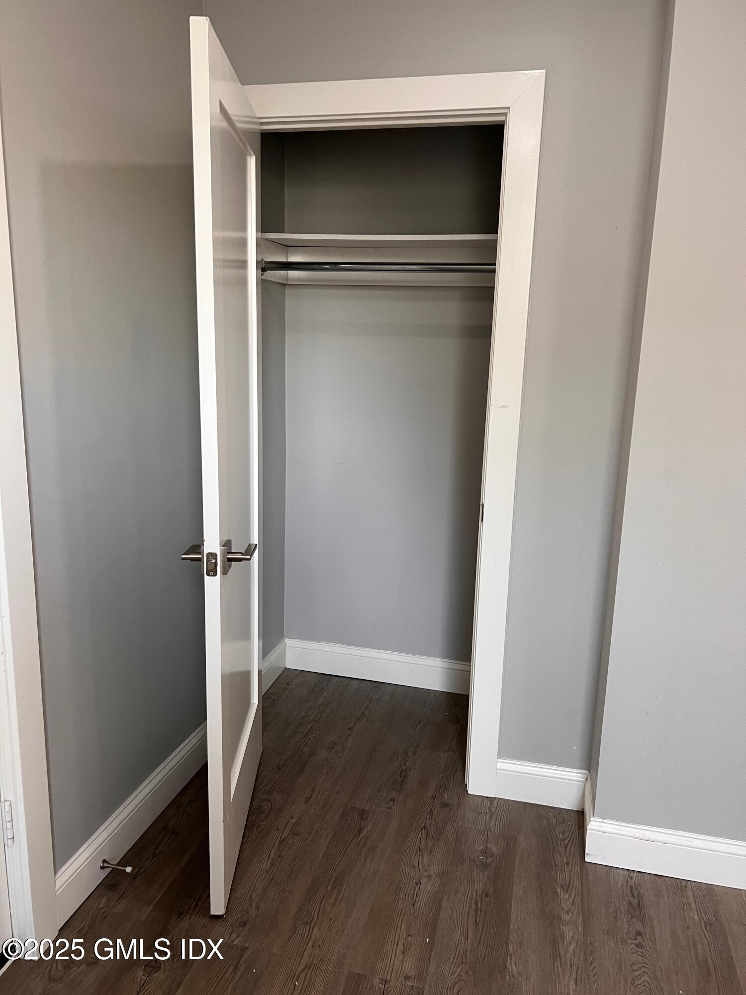 15 Beech Street, Unit 2N Greenwich, CT 06830 - Photo 11 of 15 a view of walk in closet with wooden floor