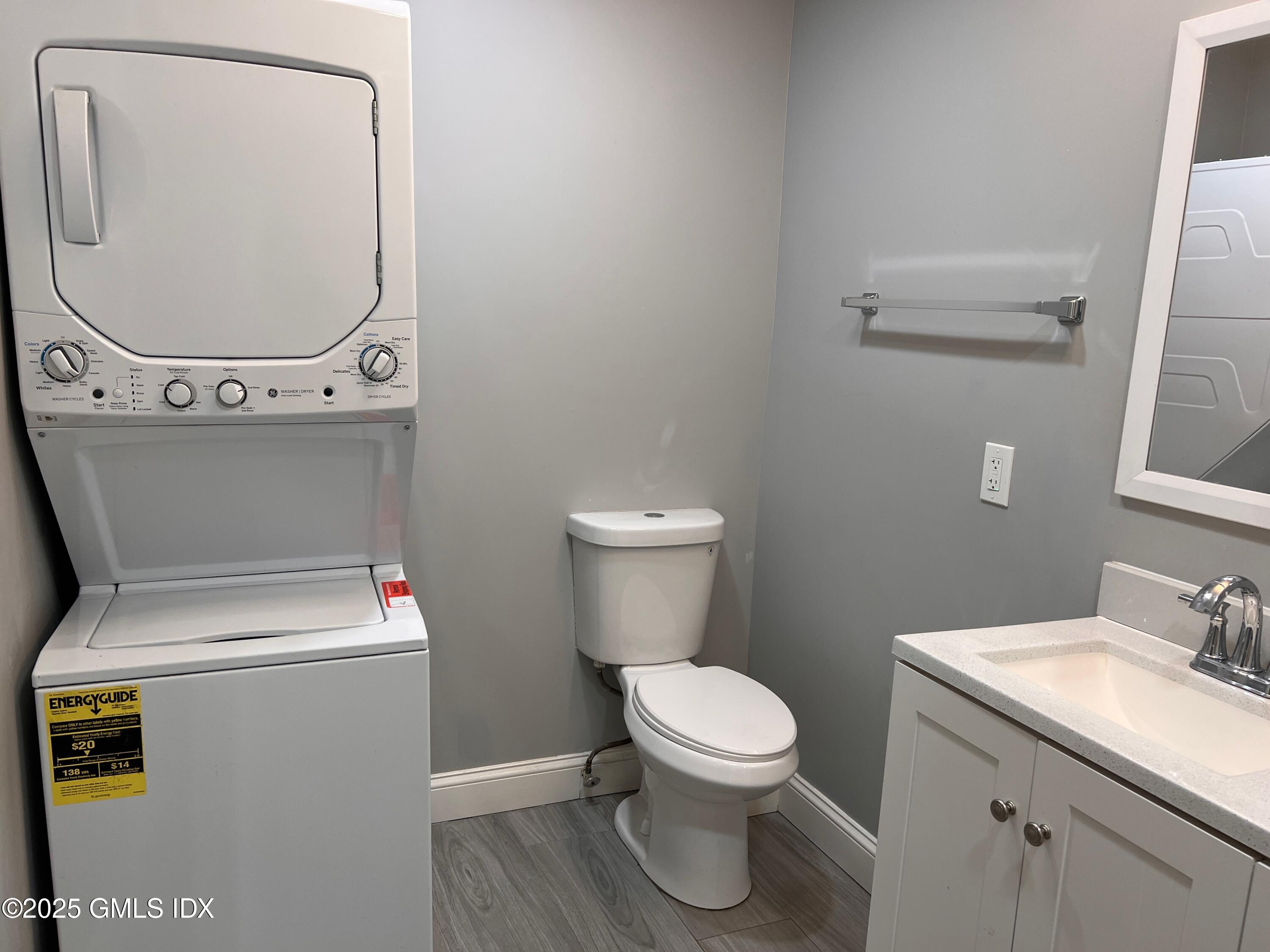 15 Beech Street, Unit 2N Greenwich, CT 06830 - Photo 15 of 15 a bathroom with a toilet and a sink