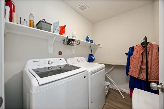 a utility room with dryer and washer