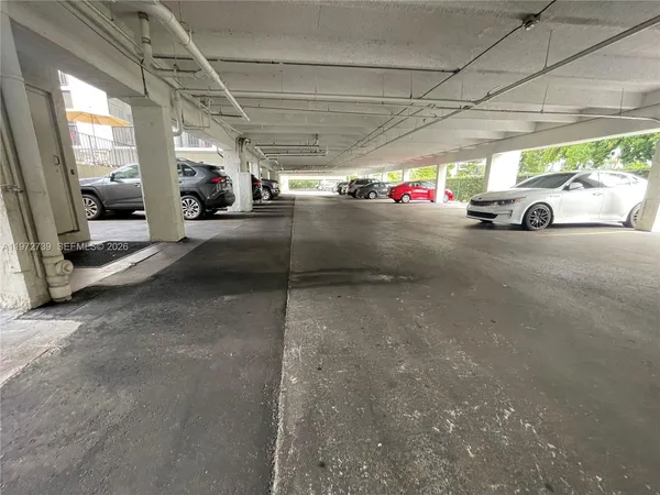 a car parking garage with a car parked