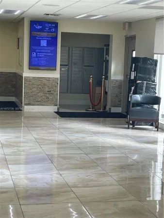 a view of a entryway door of the room