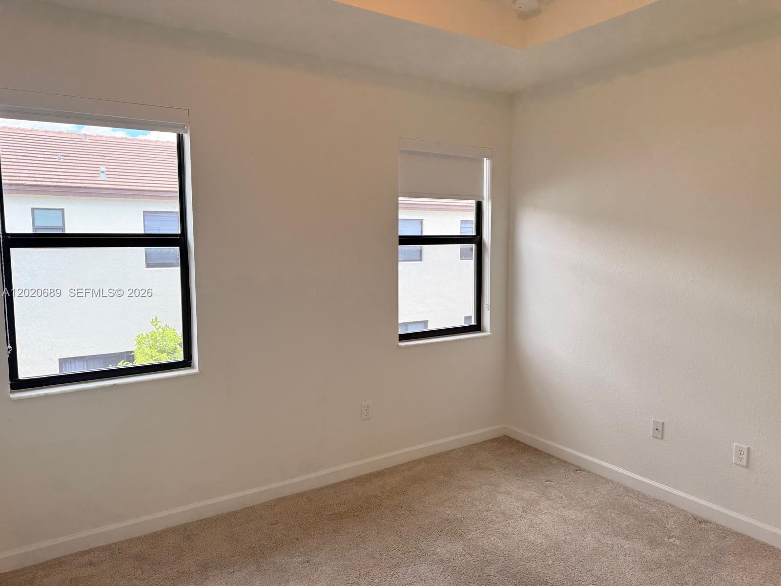 12875 Southwest 231st Terrace Miami, FL 33170 - Photo 13 of 25 an empty room with a window