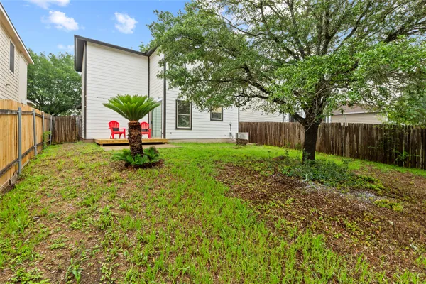 a view of a backyard with a garden