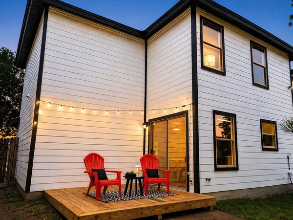 a view of house with outdoor seating