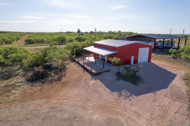 a view of a terrace with a yard