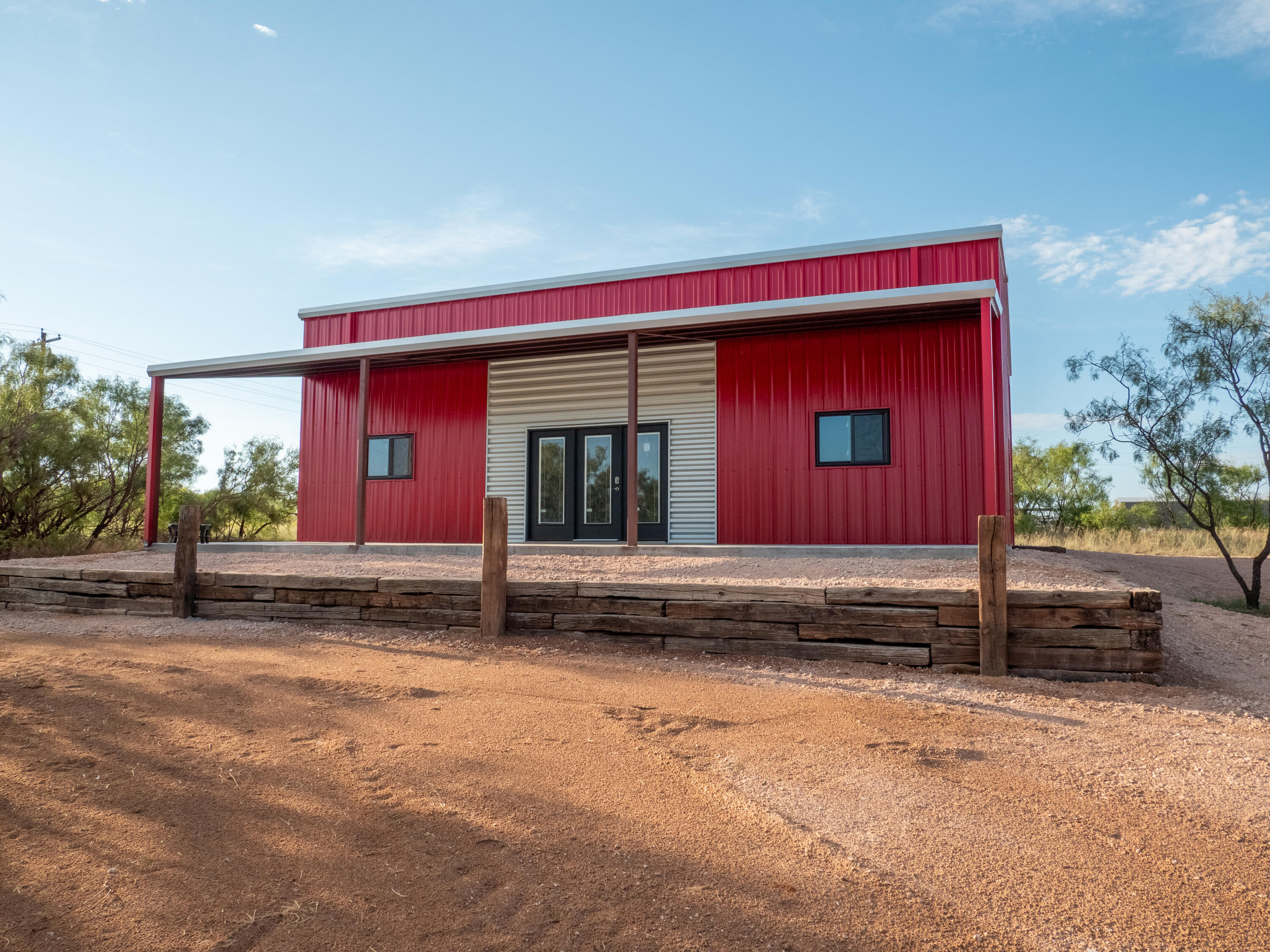 44 Fm, Unit 3519 Justiceburg, TX 79330 - Photo 2 of 21 a house with red door