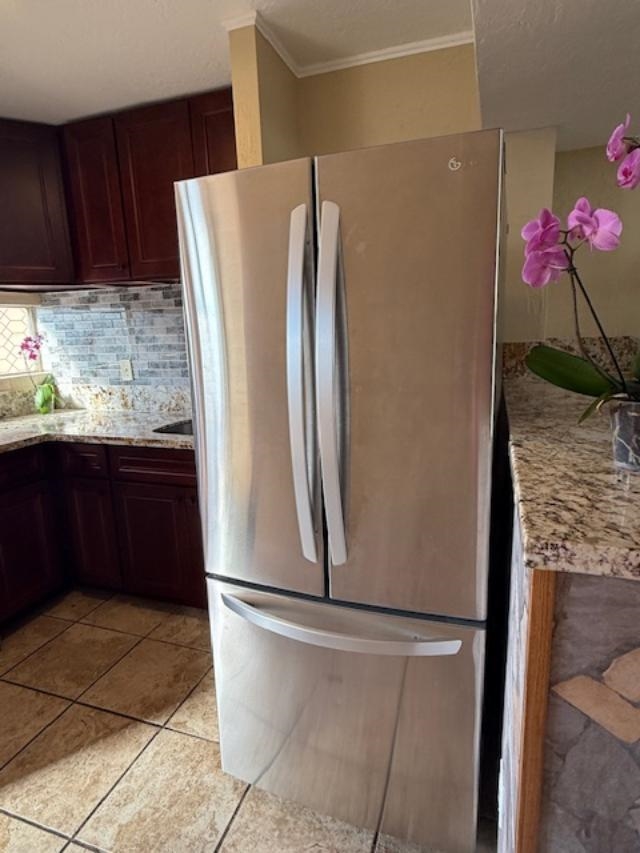 3676 Lower Honoapiilani Road, Unit C301 Lahaina, HI 96761 - Photo 11 of 49 a kitchen with stainless steel appliances granite countertop a refrigerator and a stove