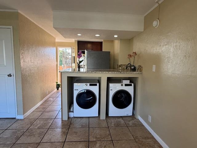 3676 Lower Honoapiilani Road, Unit C301 Lahaina, HI 96761 - Photo 18 of 49 a view of a kitchen with a washer and dryer