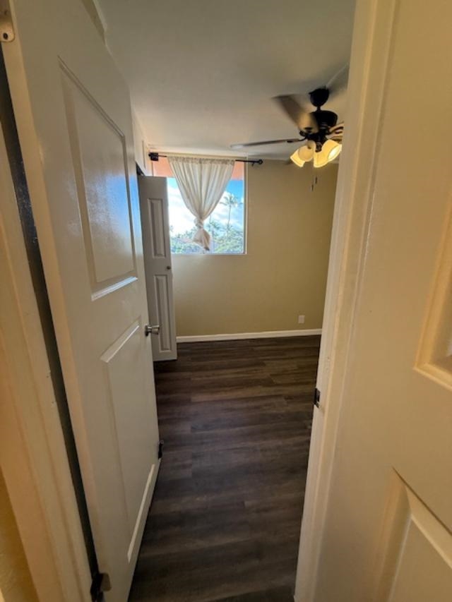 3676 Lower Honoapiilani Road, Unit C301 Lahaina, HI 96761 - Photo 23 of 49 a view of a hallway with wooden floor and staircase
