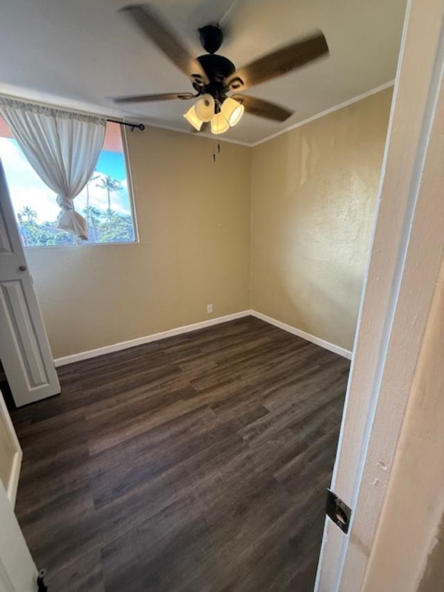 3676 Lower Honoapiilani Road, Unit C301 Lahaina, HI 96761 - Photo 25 of 49 en empty room with wooden floor and fan