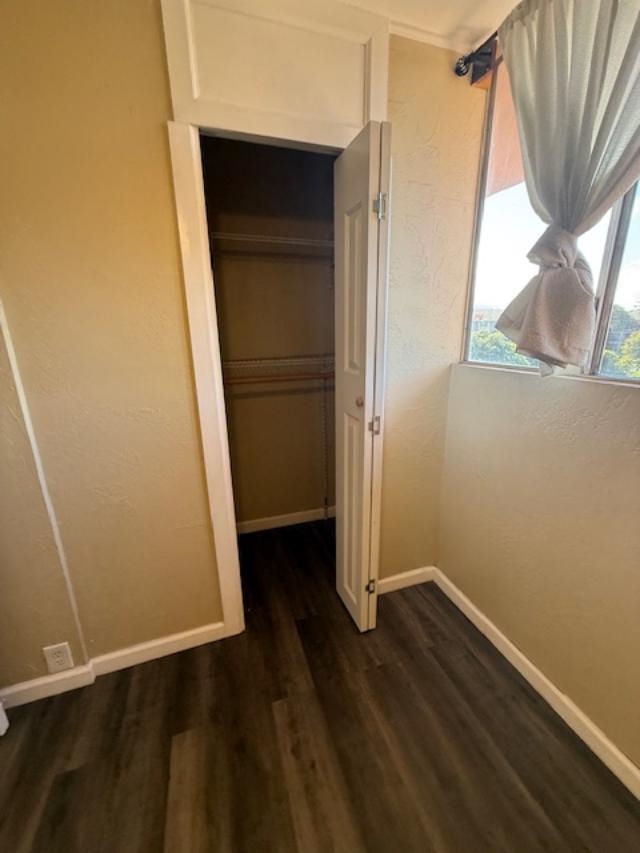 3676 Lower Honoapiilani Road, Unit C301 Lahaina, HI 96761 - Photo 27 of 49 an empty room with wooden floor and windows