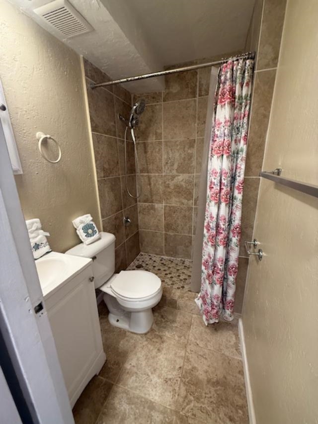 3676 Lower Honoapiilani Road, Unit C301 Lahaina, HI 96761 - Photo 31 of 49 a bathroom with a toilet and shower