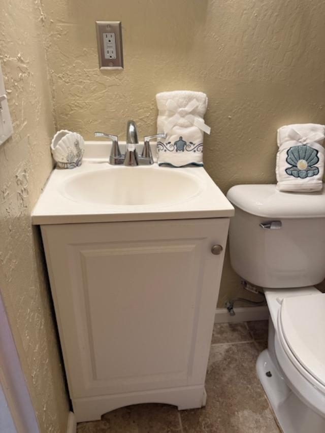 3676 Lower Honoapiilani Road, Unit C301 Lahaina, HI 96761 - Photo 33 of 49 a bathroom with a sink toilet and a mirror