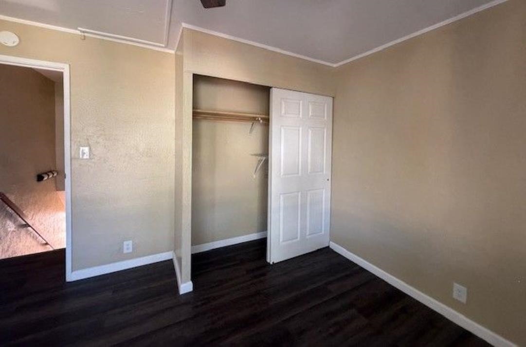 3676 Lower Honoapiilani Road, Unit C301 Lahaina, HI 96761 - Photo 39 of 49 an empty room with wooden floor and entrance