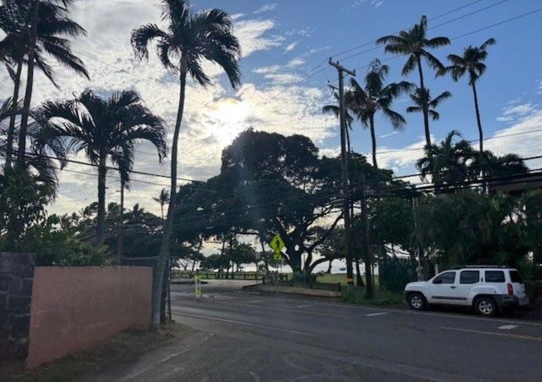 3676 Lower Honoapiilani Road, Unit C301 Lahaina, HI 96761 - Photo 48 of 49 a cars parked on the side of a street