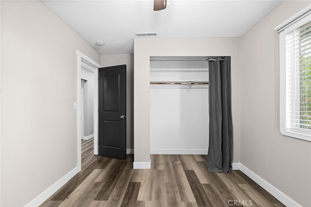 1131 Stewart Avenue Chico, CA 95926 - Photo 22 of 51 a view of a room with wooden floor and a window
