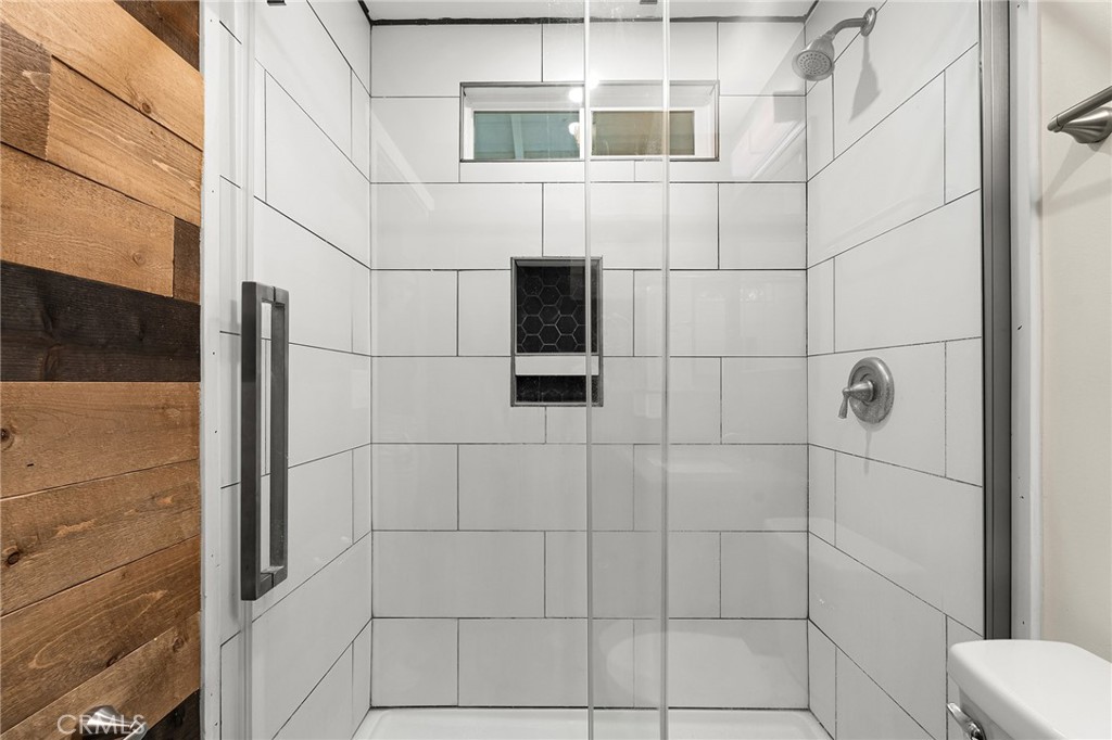 1131 Stewart Avenue Chico, CA 95926 - Photo 27 of 51 a bathroom with a toilet and shower