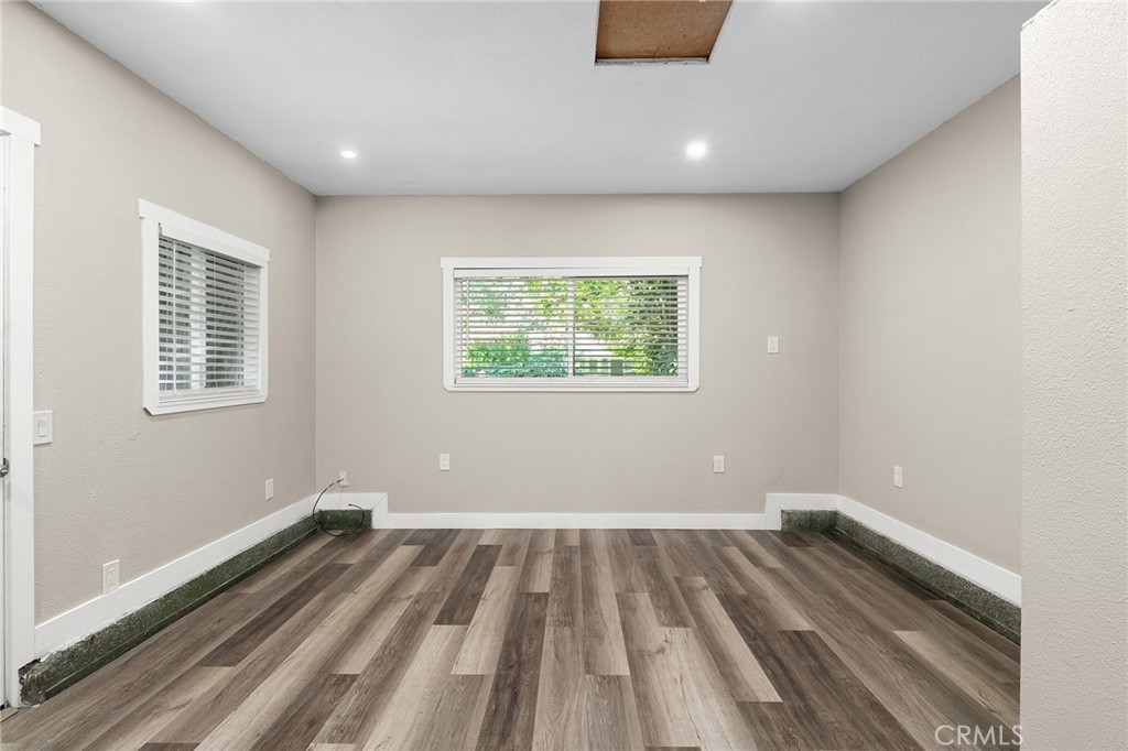 1131 Stewart Avenue Chico, CA 95926 - Photo 30 of 51 a view of a room with wooden floor and window