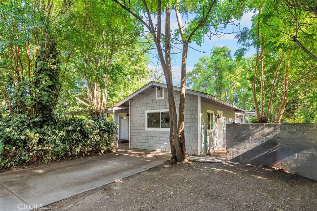1131 Stewart Avenue Chico, CA 95926 - Photo 33 of 51 a house with a tree in front of it
