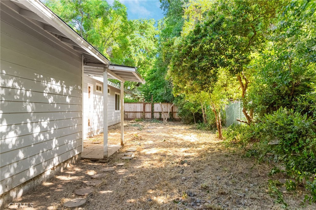 1131 Stewart Avenue Chico, CA 95926 - Photo 41 of 51 a view of a yard with a tree
