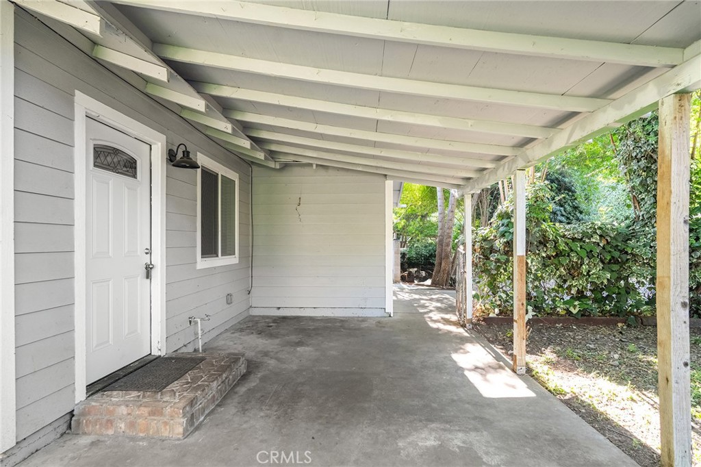 1131 Stewart Avenue Chico, CA 95926 - Photo 6 of 51 a view of a room with wooden walls and floor to ceiling window