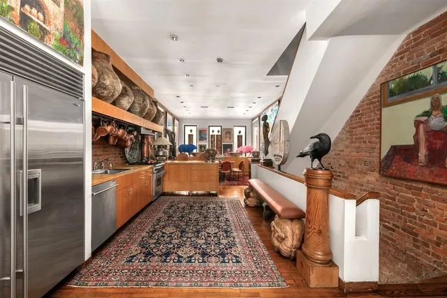 a large room with lots of wooden furniture