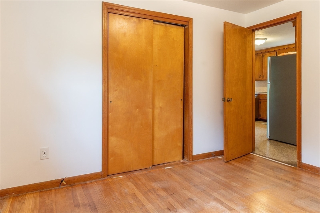 59 Mountain Road Holyoke, MA 01040 - Photo 17 of 40 a view of an empty room with closet and a window