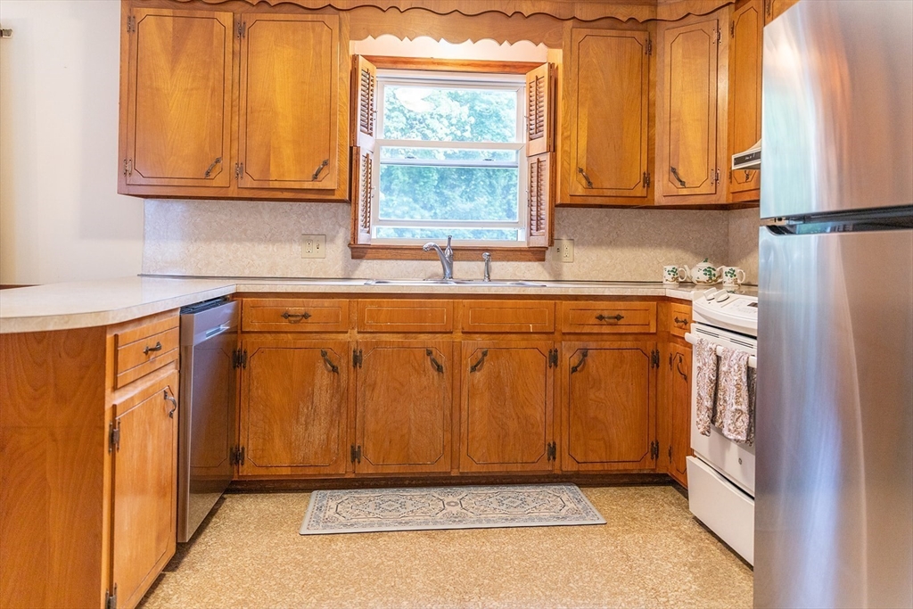 59 Mountain Road Holyoke, MA 01040 - Photo 3 of 40 a view of a kitchen with a window