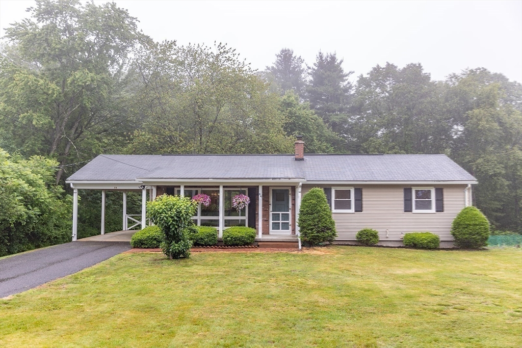 59 Mountain Road Holyoke, MA 01040 - Photo 39 of 40 a front view of a house with a garden