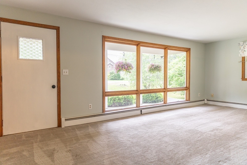 59 Mountain Road Holyoke, MA 01040 - Photo 9 of 40 a view of an empty room with a large window