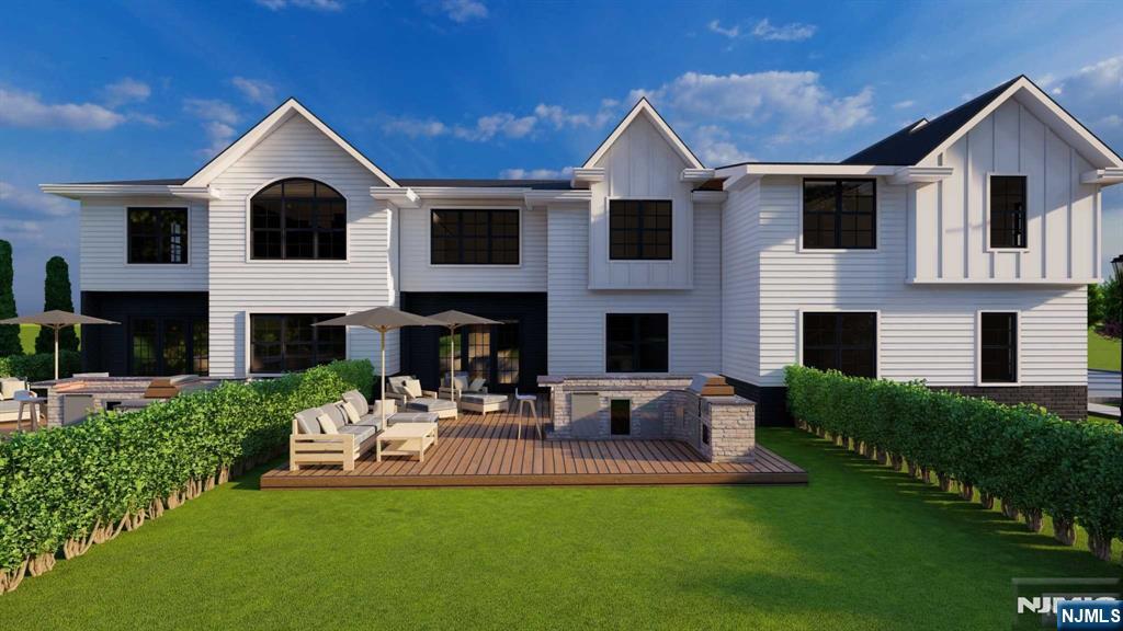 8 Cedar Court Demarest, NJ 07627 - Photo 7 of 8 a front view of a house with a yard