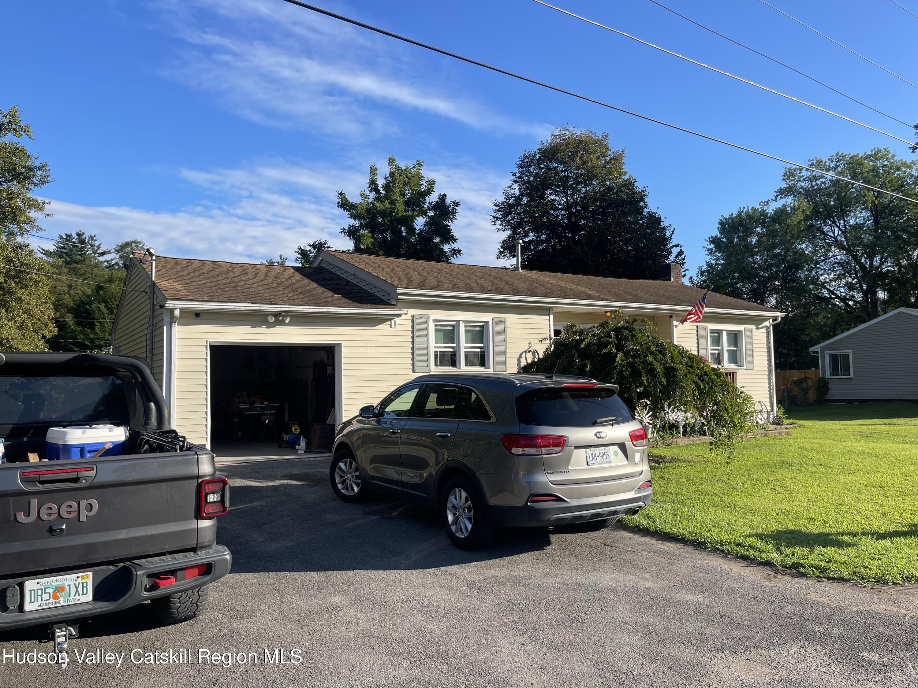 10 Johns Road Kerhonkson, NY 12446 - Photo 6 of 30 a car parked in front of white house